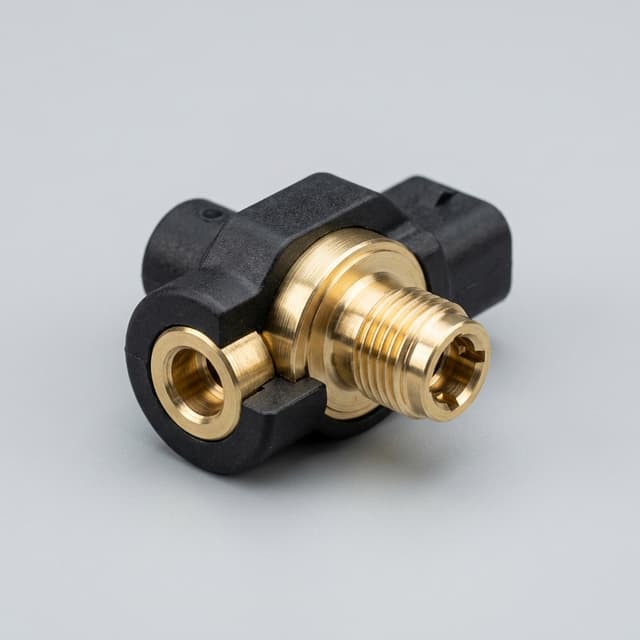 Precision insert molded magnetic sensor rotor